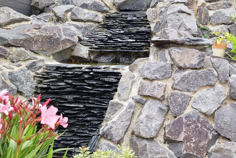 Mauersteine für Trockenmauer – Wasserbausteine Bruchsteine Basalt 10-40 cm